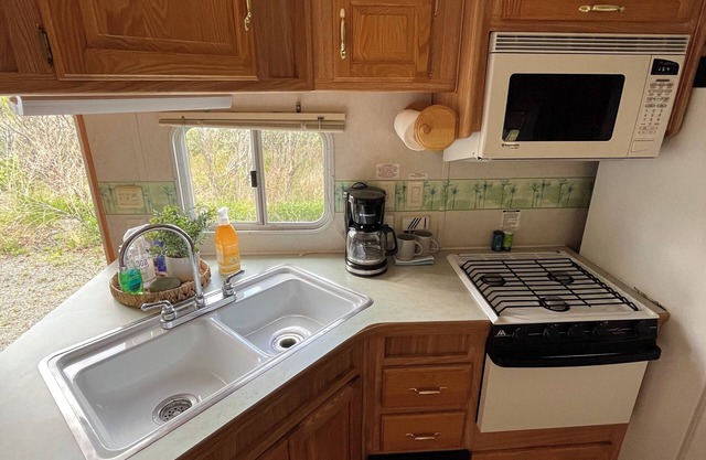 Beautiful cozy renovated RV situated on 100 private acres