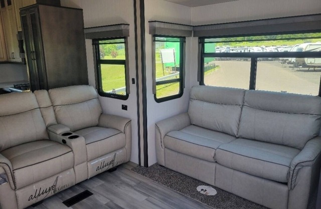 Beautiful fifth wheel by the river