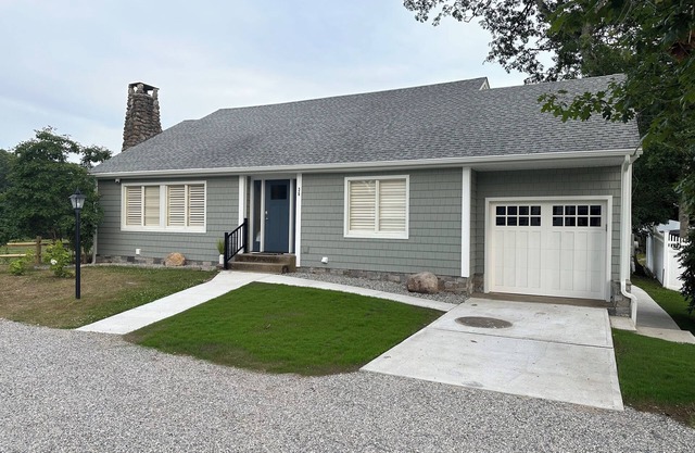 Beautiful home on Lords Point in Stonington CT with lots of parking on large lot