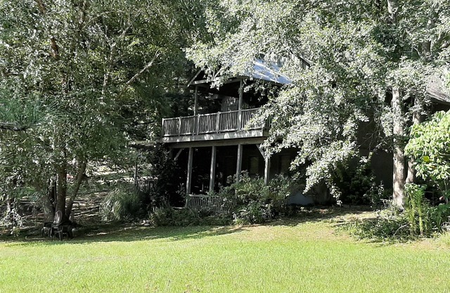 Beautiful home on pond with several decks in very private and quiet neighborhood