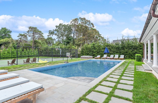 Beautiful home with pool, tennis court, game room, central AC, & washer/dryer