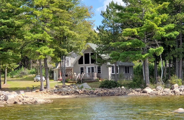Beautiful Lakefront Home with Stunning Sunsets and Private Beach!