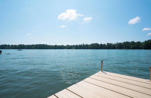 Beautiful Lake Home with large private frontage on crystal clear spring-fed lake