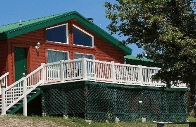 Schöne Blockhütte in szenischem Chama, New Mexiko