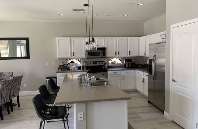 Beautiful pool home with game room, basketball & hot tub