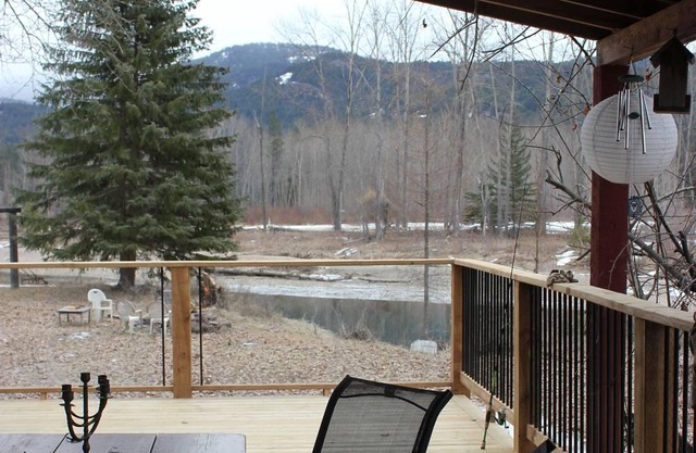 Beautiful Riverfront Home on Acreage