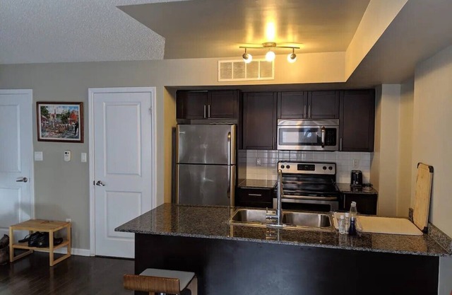 Beautiful Three Story Townhouse + Parking + Patios
