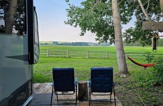 Beautiful Treed Oasis in the country and only 10 min to town with all amenities.