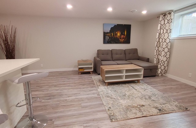 Beautiful two bedroom and an office lower level suit