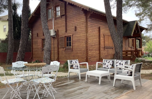 Beautiful wooden villa in a charming place surrounded by nature.