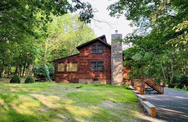 Beautiful wooden lodge cabin in the Heart of the Poconos.