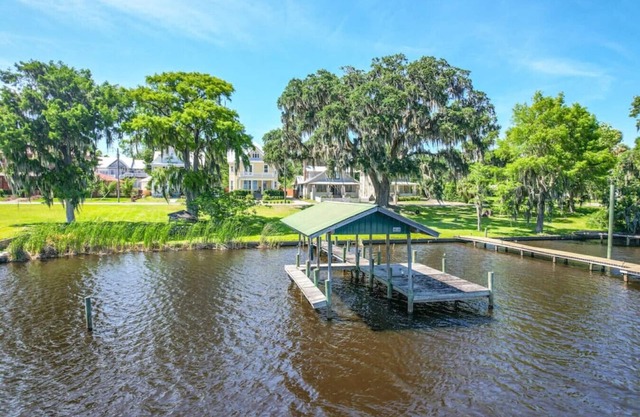 Beautifully restored home with river views & private dock!