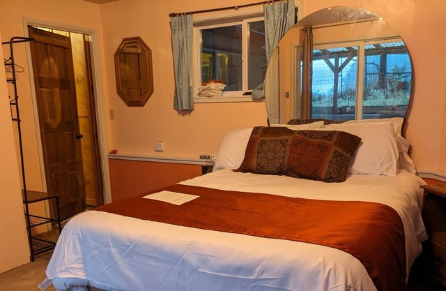 Bed and a twin bed, bedroom individual, entrance and exit to private beach