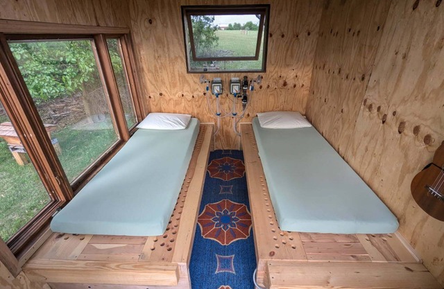 Beehive air therapy cabin with 2 bee beds for a unique, multi-sensory experience