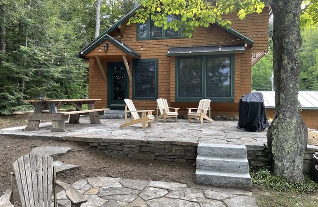 Belgrade Lakes getaway with private swim dock, outdoor living, & canoe/kayaks