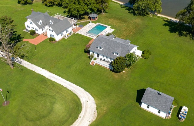 "Belle Aire Landing" a Large Beautiful Waterfront Estate! Under New Management!