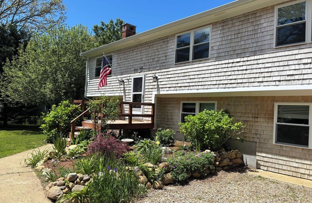 Beloved 5-bedroom house with Beach Passes, AC, fenced in yard, and hot tub