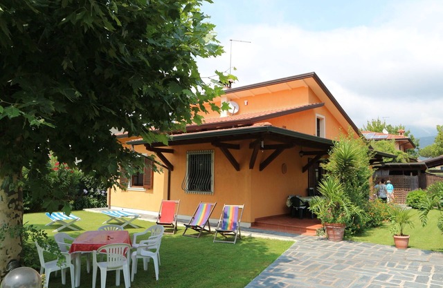 Bungalow con terrazza coperta in località balneare
