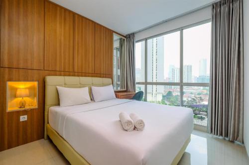 Best Homey and Nice 1BR at Ciputra World 2 Apartment By Travelio