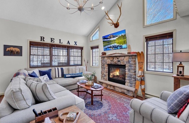 Big Bass Lake Wooded Cabin with Hot Tub, Entertainment Loft & Amenities Galore!