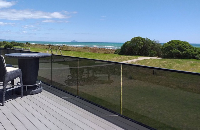 Big Black Beachfront Bach in family friendly community.