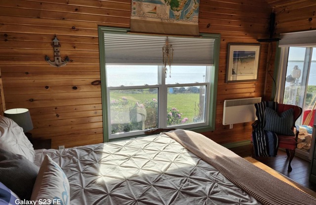 Blooming Point home on Tracadie Bay with sunset views of the National Park Dunes