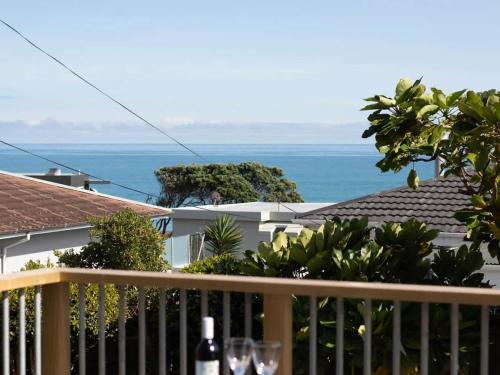 Blue Water Cottage - with beachfront coastal views