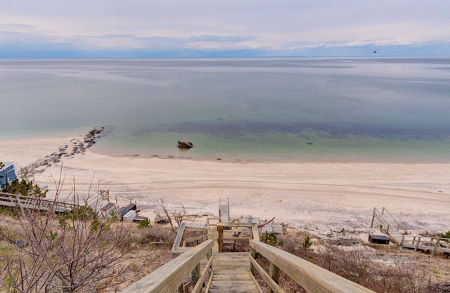 Bohemian-style home with beachfront access, open-floor plan, ample natural...