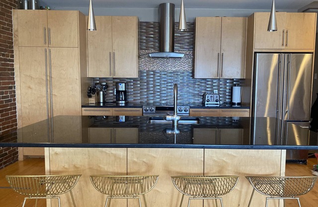 Boston Harbor views. Modern north end condo.FREE PARKING!