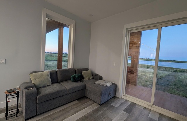 Brand New! Breathtaking 3 bedroom + den cottage on the ocean front!