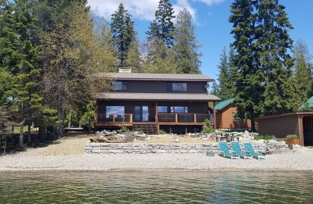 Brand New Listing. Remodeled lake home, private beach and dock