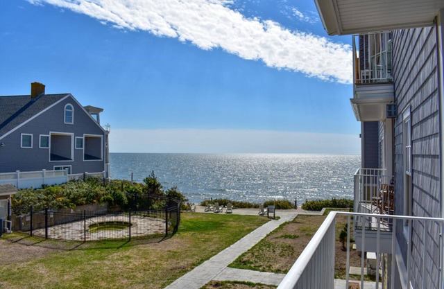 Brand new Ocean View Condo with private balcony, steps from the beach!