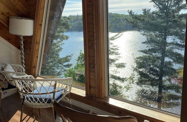 Breathtaking views from rustic cottage atop the Edge of Kennisis Lakes!