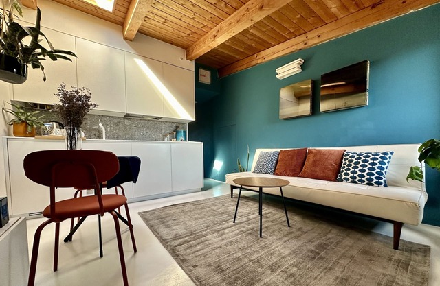 Bright apartment nestled in a green setting