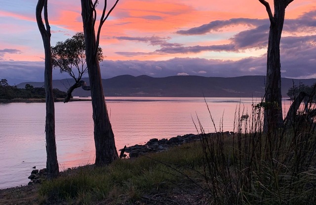 Set on five acres, private waterfront house with panoramic views