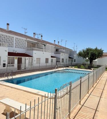 Bungalow with a pool and a terrace