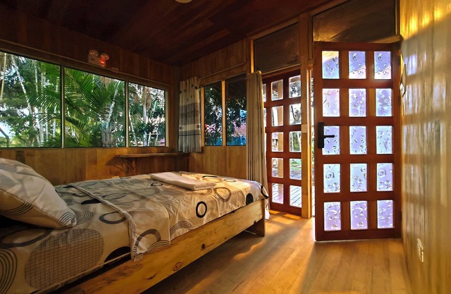 Cabins and lake, abundant vegetation and wildlife in the heart of downtown Iquitos