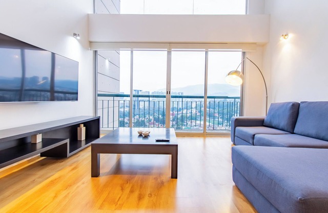 1202 - Exclusive 2BR Duplex w/Garden @CapitaliaLiving