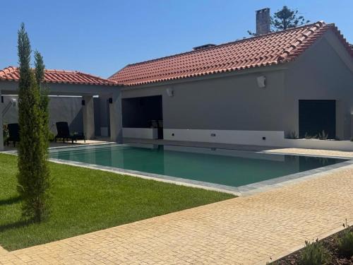 Casa com jardim perto da praia
