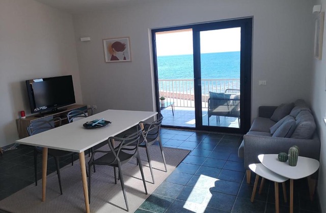 casa con terrazza fronte mare