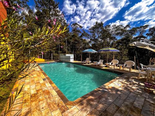 Casa de campo com churrasq e piscina em Embura SP