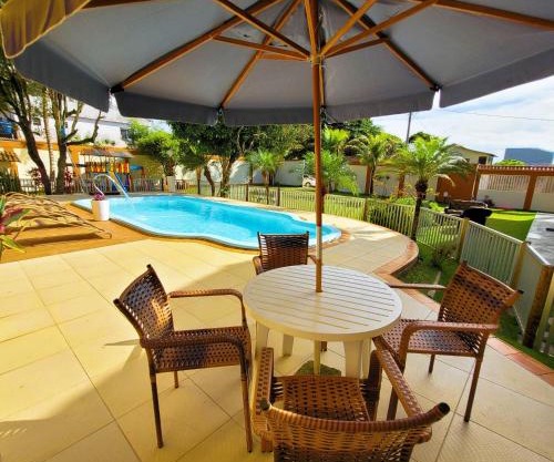 Casa de praia com piscina e playground