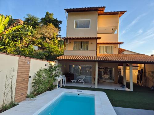 Casa e flat com piscina - Praia da Enseada