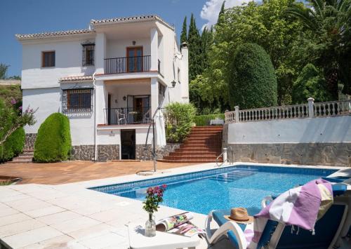 Casa El Pilar con piscina, jardín y barbacoa