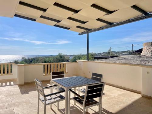 CASA ELAIO - immersa negli ulivi con vista sul mare Ionio