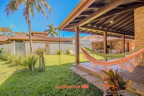 Casa em Ubatuba com área gourmet e acesso a rio