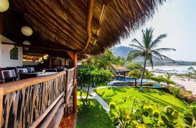 Whole House Rental - Beach Front Location on Manzanillo Bay, 7 BR, Pool, Surf in front of doorstep!
