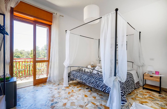 Ferienwohnung 'Casa Merlino - Matrimoniale' mit Balkon, Wi-Fi und Klimaanlage