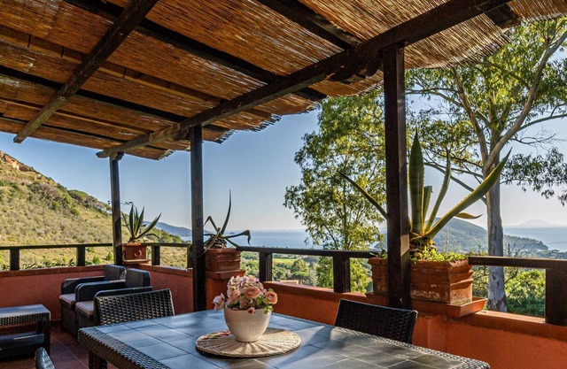 Three roomed apartment with stunning view near the long sandy beach of Lacona.