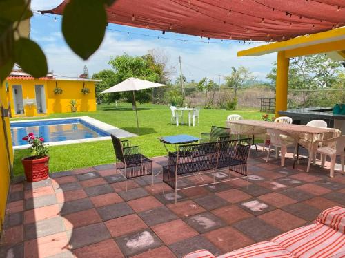 "Casa San Miguel" Alberca privada, jardín, wifi, proyector,asador a 15 min de Cuautla en Morelos